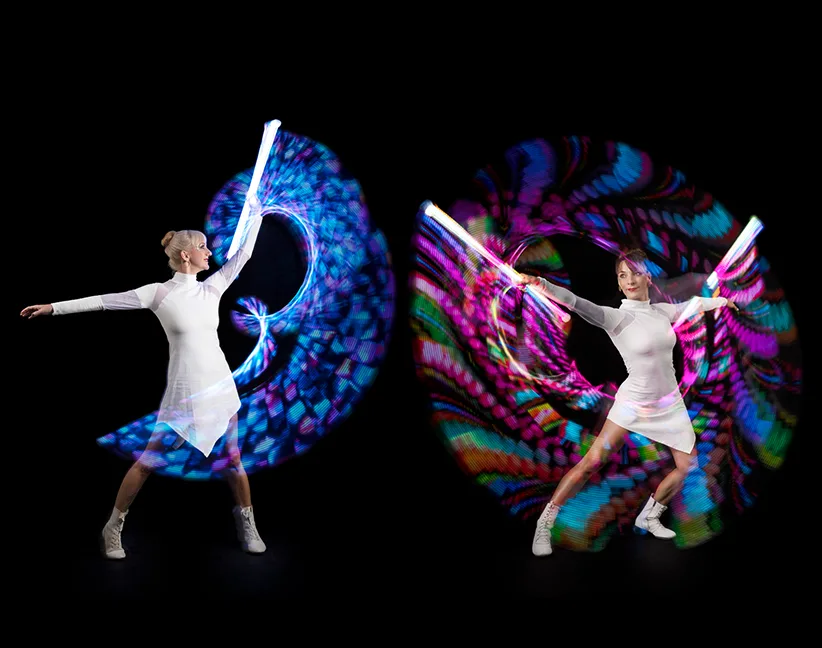 Duo de danseuses en spectacle LED lors d’un événement.